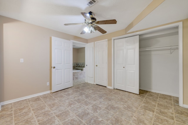 360 Holiday Ln, Coldspring, TX 77331 - unfurnished bedroom featuring baseboards and a ceiling fan