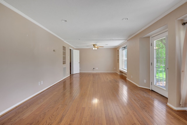 360 Holiday Ln, Coldspring, TX 77331 - spare room with crown molding, baseboards, light wood finished floors, a ceiling fan, and recessed lighting
