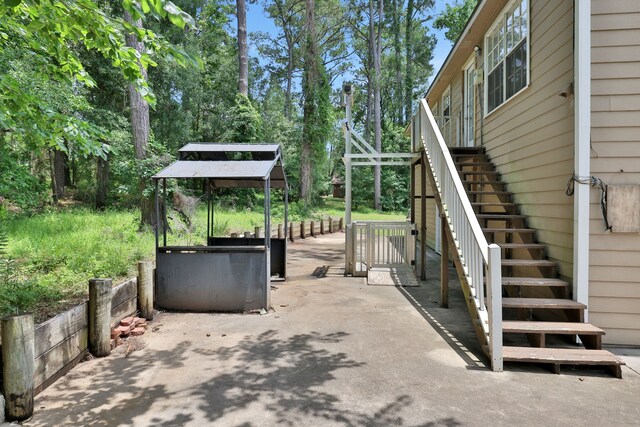 360 Holiday Ln, Coldspring, TX 77331 - view of patio / terrace featuring stairway