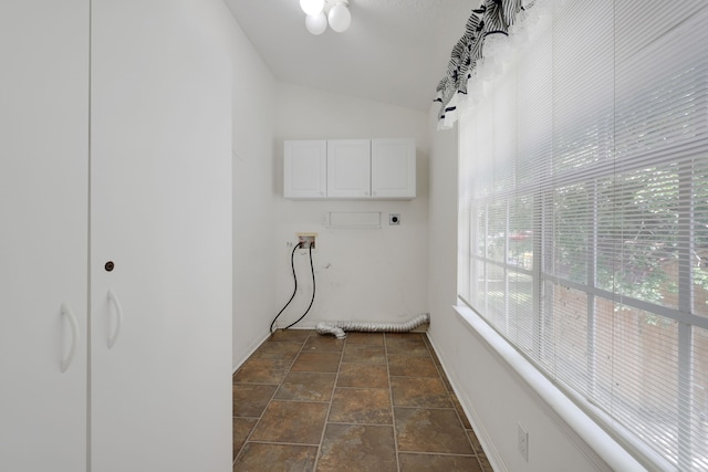 360 Holiday Ln, Coldspring, TX 77331 - laundry room with cabinet space, electric dryer hookup, healthy amount of natural light, and washer hookup