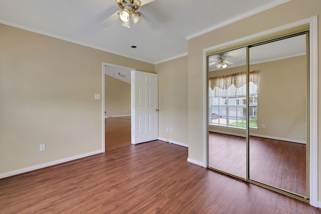 360 Holiday Ln, Coldspring, TX 77331 - unfurnished bedroom featuring wood finished floors, baseboards, ornamental molding, a closet, and ceiling fan