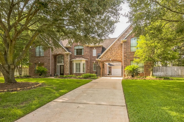 17407 W Blooming Rose Ct, Cypress, TX 77429 - view of front of house featuring driveway and brick siding