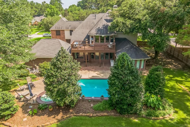 17407 W Blooming Rose Ct, Cypress, TX 77429 - rear view of house featuring a patio area, a deck, a fenced backyard, and brick siding
