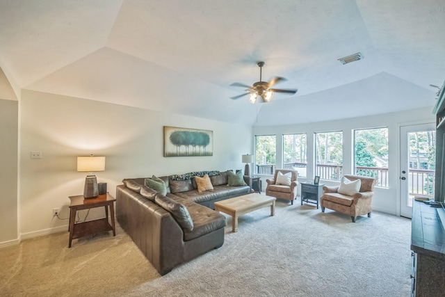 17407 W Blooming Rose Ct, Cypress, TX 77429 - carpeted living room featuring healthy amount of natural light, vaulted ceiling, a ceiling fan, and baseboards