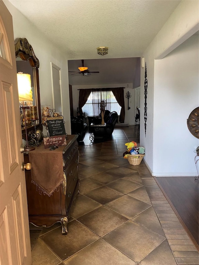 7706 Cloverlake Ct, Houston, TX 77040 - hall featuring a textured ceiling and tile patterned flooring