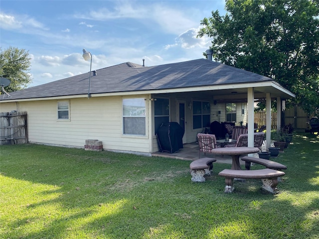 7706 Cloverlake Ct, Houston, TX 77040 - rear view of house with a patio and a shingled roof