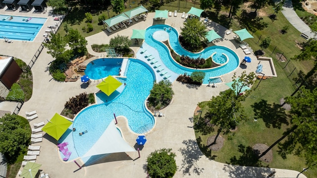 121 N Cadence Hills Loop, Conroe, TX 77318 - drone / aerial view of a pool area