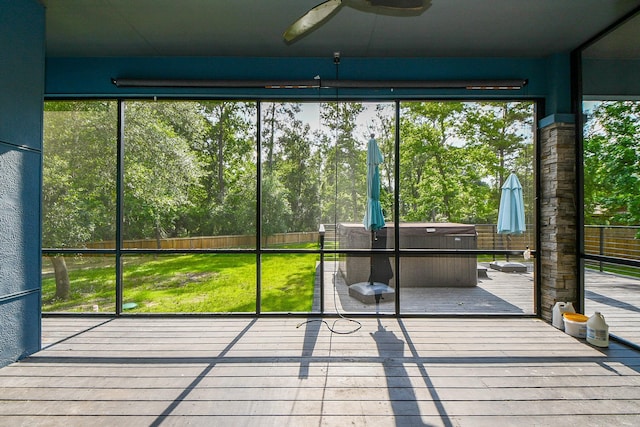 11007 Olde Mint House Ln, Tomball, TX 77375 - unfurnished sunroom with a jacuzzi and ceiling fan