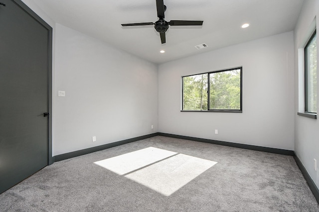 11007 Olde Mint House Ln, Tomball, TX 77375 - carpeted spare room featuring plenty of natural light, recessed lighting, a ceiling fan, and baseboards