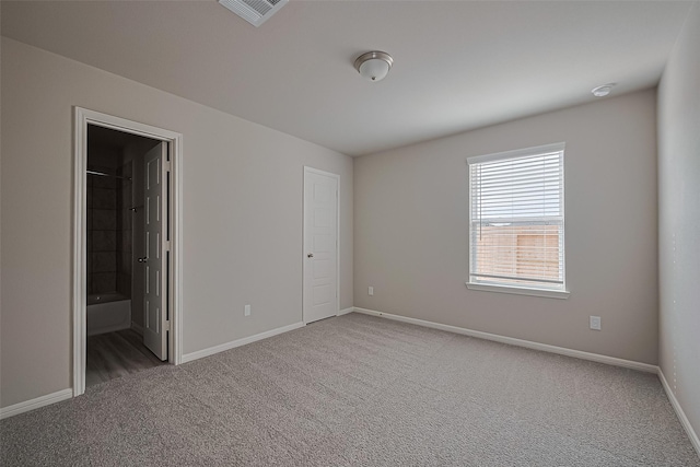 27227 Blue Pool Dr, Katy, TX 77493 - unfurnished bedroom with carpet flooring, baseboards, and ensuite bath