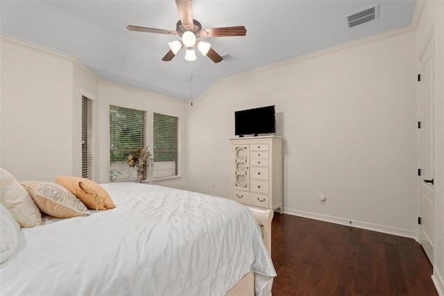 2428 Village Grn, Conroe, TX 77304 - bedroom with dark wood-type flooring, baseboards, crown molding, and a ceiling fan