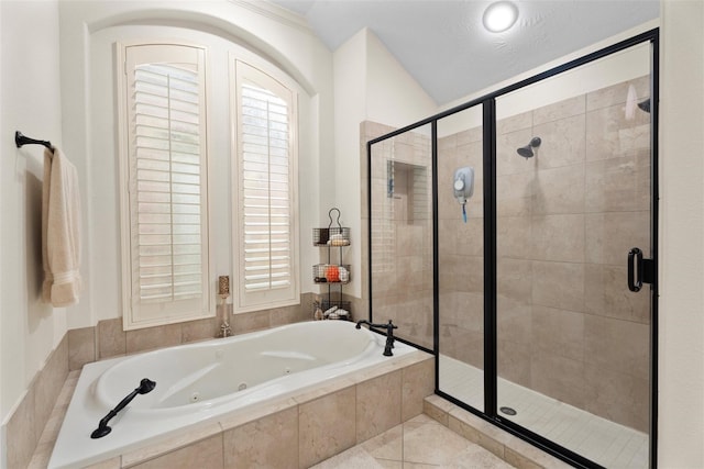 2428 Village Grn, Conroe, TX 77304 - full bathroom with a tub with jets, a stall shower, and lofted ceiling