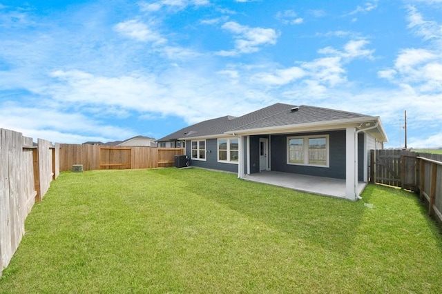 1307 Bonnerjee Dr, Crosby, TX 77532 - rear view of house with central air condition unit, a patio area, and a shingled roof