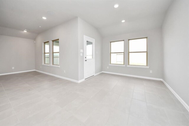 1307 Bonnerjee Dr, Crosby, TX 77532 - empty room featuring baseboards, recessed lighting, and light tile patterned floors
