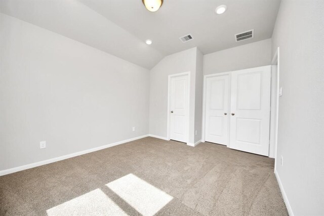 1307 Bonnerjee Dr, Crosby, TX 77532 - unfurnished bedroom featuring carpet floors, lofted ceiling, baseboards, and recessed lighting