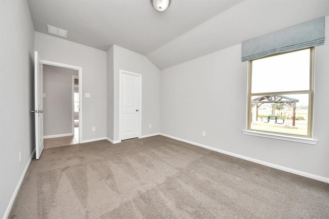 1307 Bonnerjee Dr, Crosby, TX 77532 - unfurnished bedroom featuring vaulted ceiling, carpet flooring, and baseboards