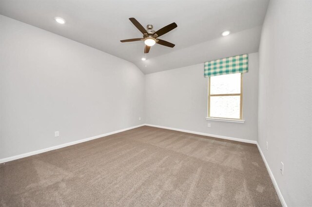 1307 Bonnerjee Dr, Crosby, TX 77532 - carpeted empty room with ceiling fan, baseboards, vaulted ceiling, and recessed lighting