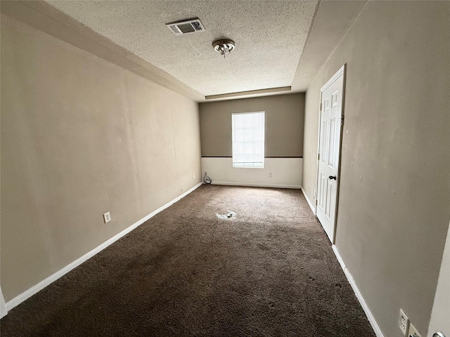 773 Lucky St, Houston, TX 77088 - spare room featuring carpet flooring, a textured ceiling, and baseboards