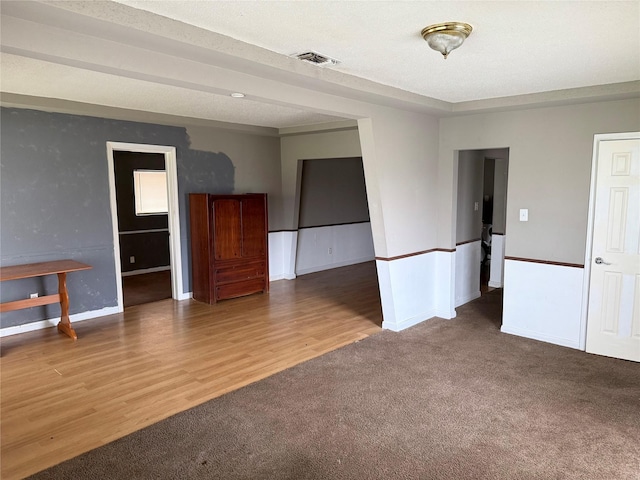 773 Lucky St, Houston, TX 77088 - unfurnished room featuring carpet floors, baseboards, and wood finished floors