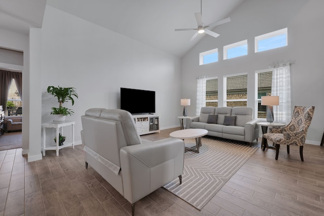 308 Spruce Oak Ln, Waller, TX 77484 - living area with high vaulted ceiling, wood finished floors, ceiling fan, and baseboards