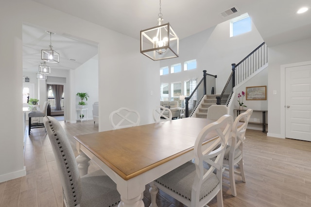 308 Spruce Oak Ln, Waller, TX 77484 - dining area featuring plenty of natural light, a chandelier, and light wood-style flooring