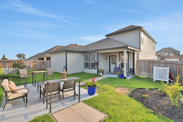 308 Spruce Oak Ln, Waller, TX 77484 - rear view of property featuring a patio and a shingled roof