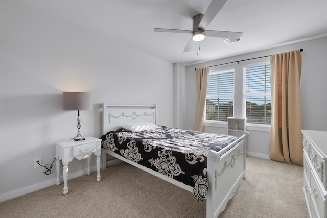 308 Spruce Oak Ln, Waller, TX 77484 - bedroom with light colored carpet, baseboards, and ceiling fan