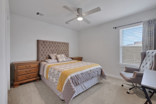308 Spruce Oak Ln, Waller, TX 77484 - bedroom with light carpet, ceiling fan, and baseboards