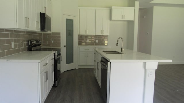 336 Autumn Ln, Livingston, TX 77351 - kitchen featuring range with electric stovetop, a sink, dishwasher, decorative backsplash, and dark wood finished floors