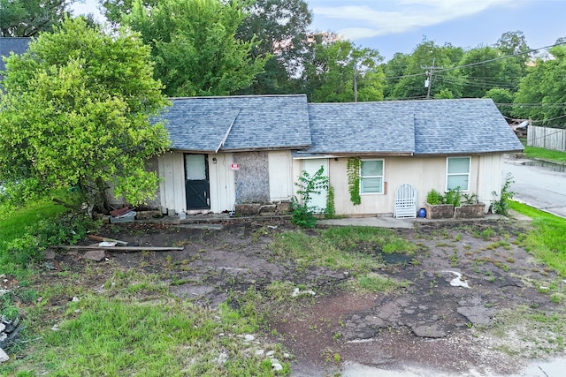 202 Booker T Washington St, Conroe, TX 77301 - view of front of home with a shingled roof