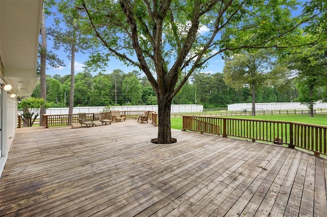 15460 Paradise Point Dr, Willis, TX 77318 - wooden deck featuring view of wooded area