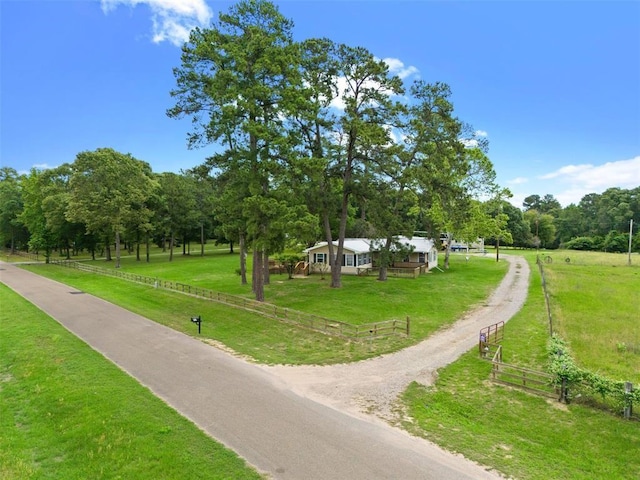 15460 Paradise Point Dr, Willis, TX 77318 - view of home's community featuring a rural view and driveway