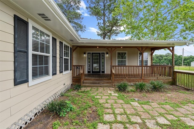15460 Paradise Point Dr, Willis, TX 77318 - entrance to property with covered porch