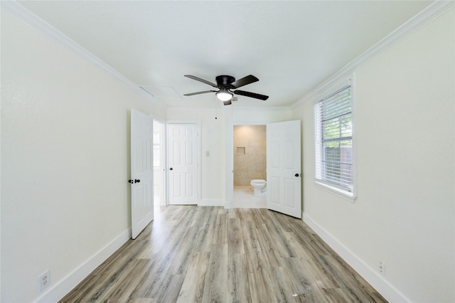 5326 Keystone St, Houston, TX 77021 - unfurnished bedroom with ornamental molding, light wood finished floors, baseboards, connected bathroom, and a ceiling fan