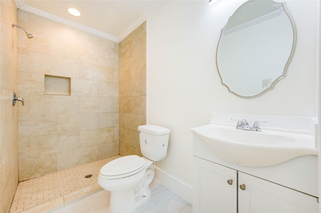 5326 Keystone St, Houston, TX 77021 - full bathroom with vanity, toilet, a tile shower, crown molding, and baseboards