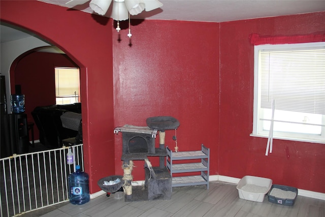 7615 Appleton St, Houston, TX 77022 - misc room featuring ceiling fan, healthy amount of natural light, and arched walkways