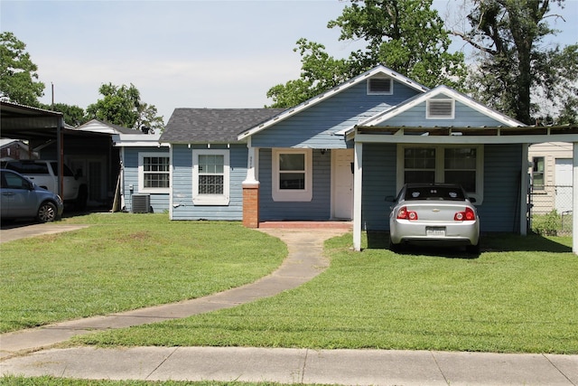 7615 Appleton St, Houston, TX 77022 - bungalow featuring a front lawn and roof with shingles
