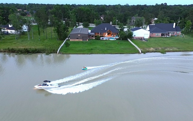 32710 Tall Oaks Way, Magnolia, TX 77354 - bird's eye view of a forest and a nearby body of water