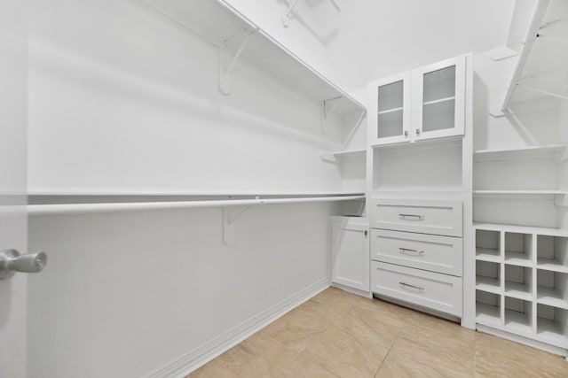 10323 Otter Cir, Baytown, TX 77523 - spacious closet with light tile patterned flooring