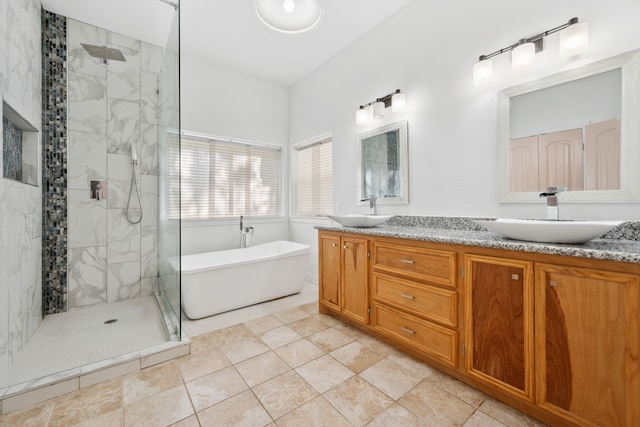 10323 Otter Cir, Baytown, TX 77523 - bathroom with a marble finish shower, a soaking tub, and double vanity
