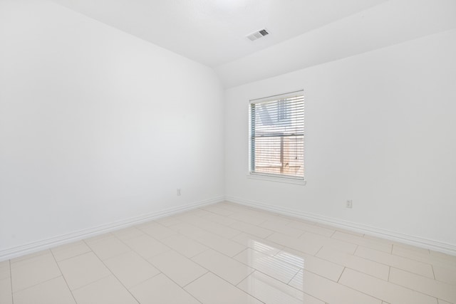 10323 Otter Cir, Baytown, TX 77523 - empty room featuring vaulted ceiling and baseboards