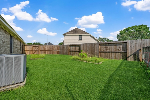 10323 Otter Cir, Baytown, TX 77523 - view of yard featuring central air condition unit