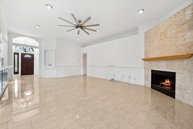 10323 Otter Cir, Baytown, TX 77523 - unfurnished living room with a fireplace, a chandelier, ceiling fan, and recessed lighting