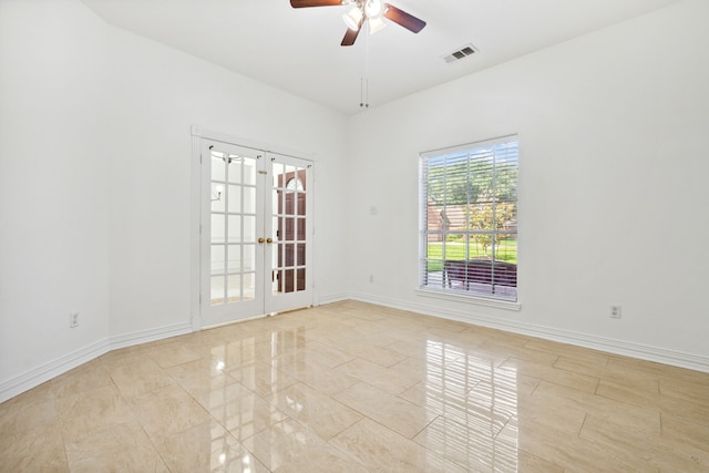 10323 Otter Cir, Baytown, TX 77523 - unfurnished room with french doors, a ceiling fan, and baseboards