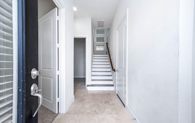 24 N N Hutcheson St, Houston, TX 77003 - foyer featuring baseboards and stairs