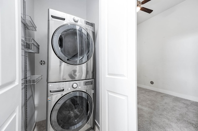 24 N N Hutcheson St, Houston, TX 77003 - laundry area with estacked washer and dryer, carpet, a ceiling fan, and baseboards