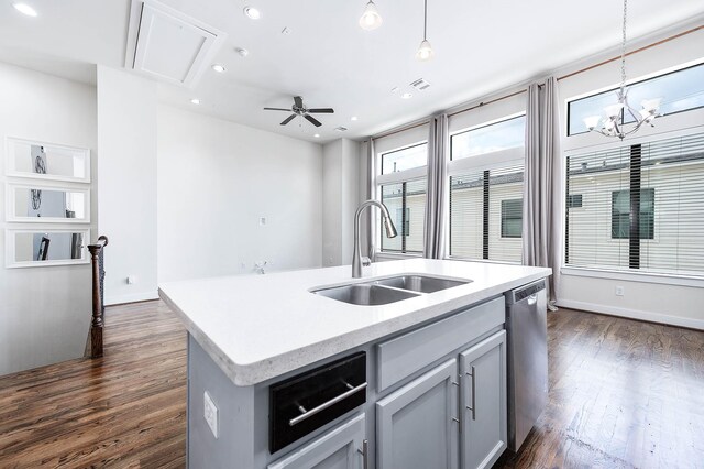 24 N N Hutcheson St, Houston, TX 77003 - kitchen with a sink, stainless steel dishwasher, dark wood-style flooring, light countertops, and an island with sink