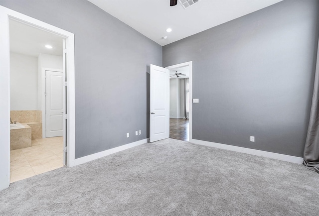 24 N N Hutcheson St, Houston, TX 77003 - unfurnished bedroom featuring carpet floors, baseboards, ensuite bath, and recessed lighting