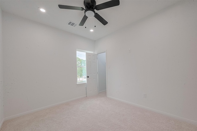 9212 Arvin St, Houston, TX 77028 - empty room with light carpet, baseboards, recessed lighting, and a ceiling fan