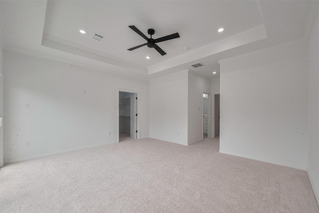 9212 Arvin St, Houston, TX 77028 - unfurnished room featuring a tray ceiling, ceiling fan, ornamental molding, recessed lighting, and light carpet